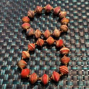Handcrafted paper bead stretch bracelets!